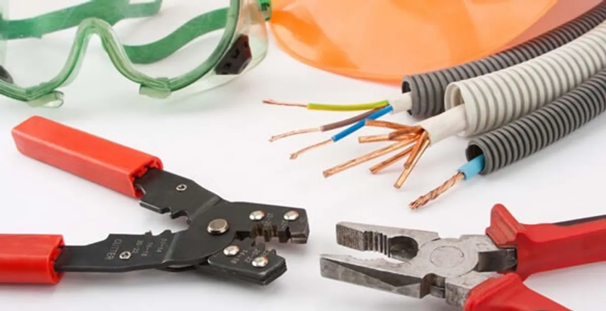 Electrical wiring repair with professional tools and safety equipment in Gotha, FL