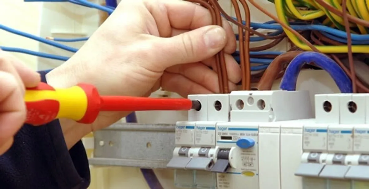 electrician services performing professional electrical panel wiring and connections in Orlando, FL